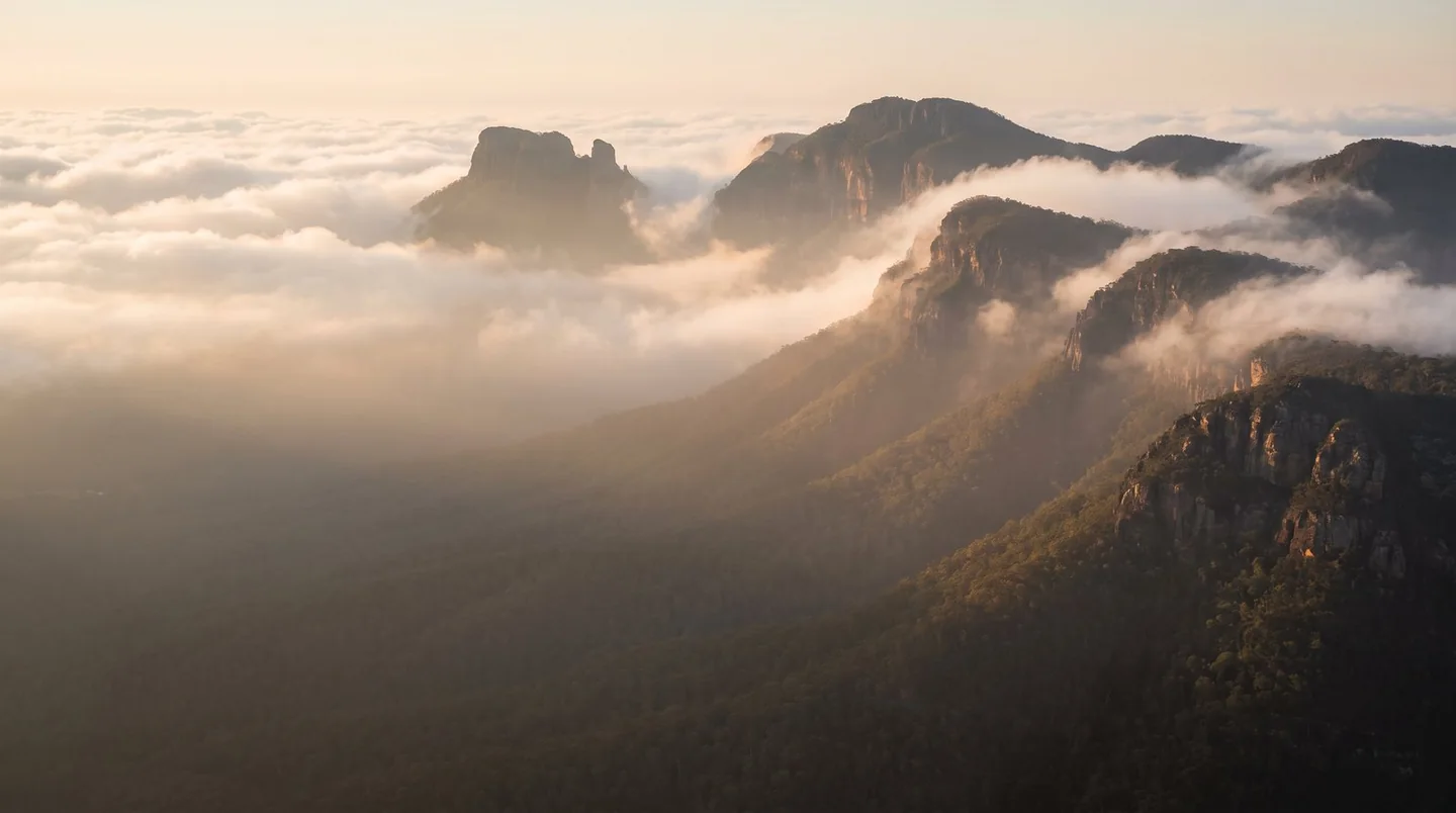 Cover image for Witness the dawn of time from the mist-shrouded peaks of the Great Escarpment