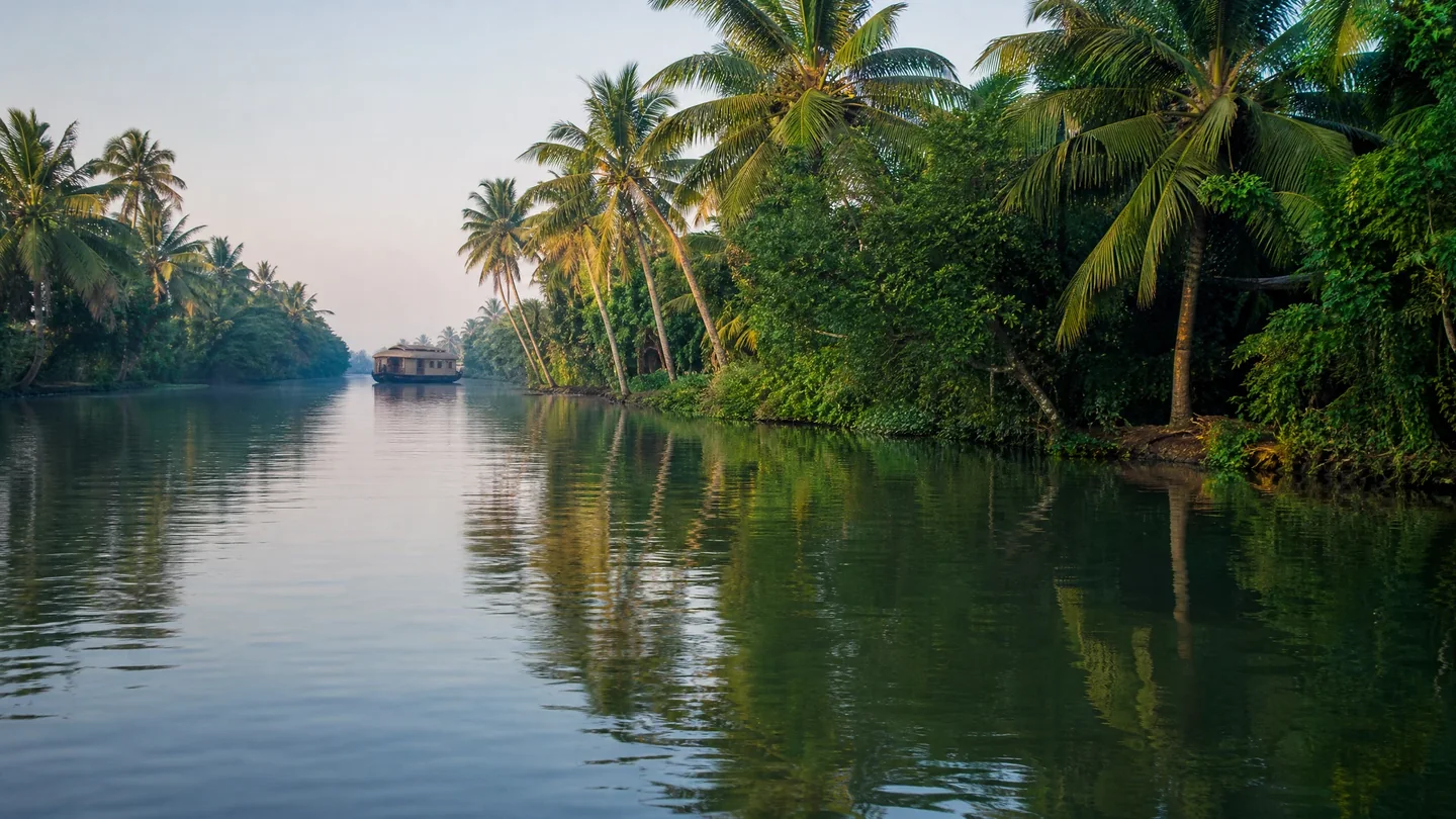 Cover image for The liquid silence of Kerala where ancient spice routes become emerald sanctuary.