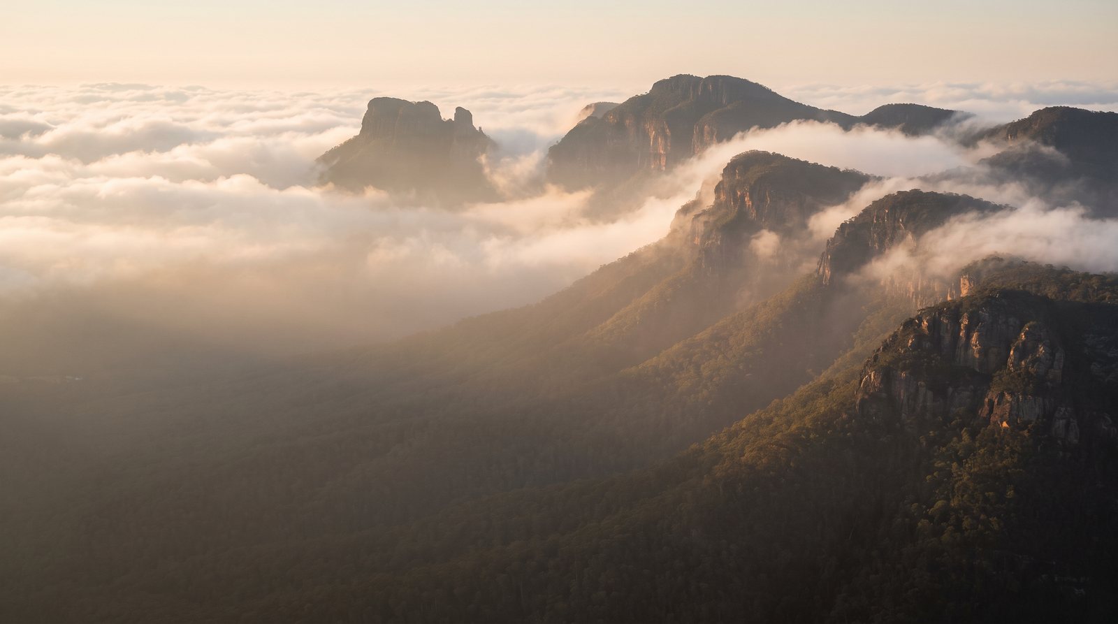 Cover image for Witness the dawn of time from the mist-shrouded peaks of the Great Escarpment